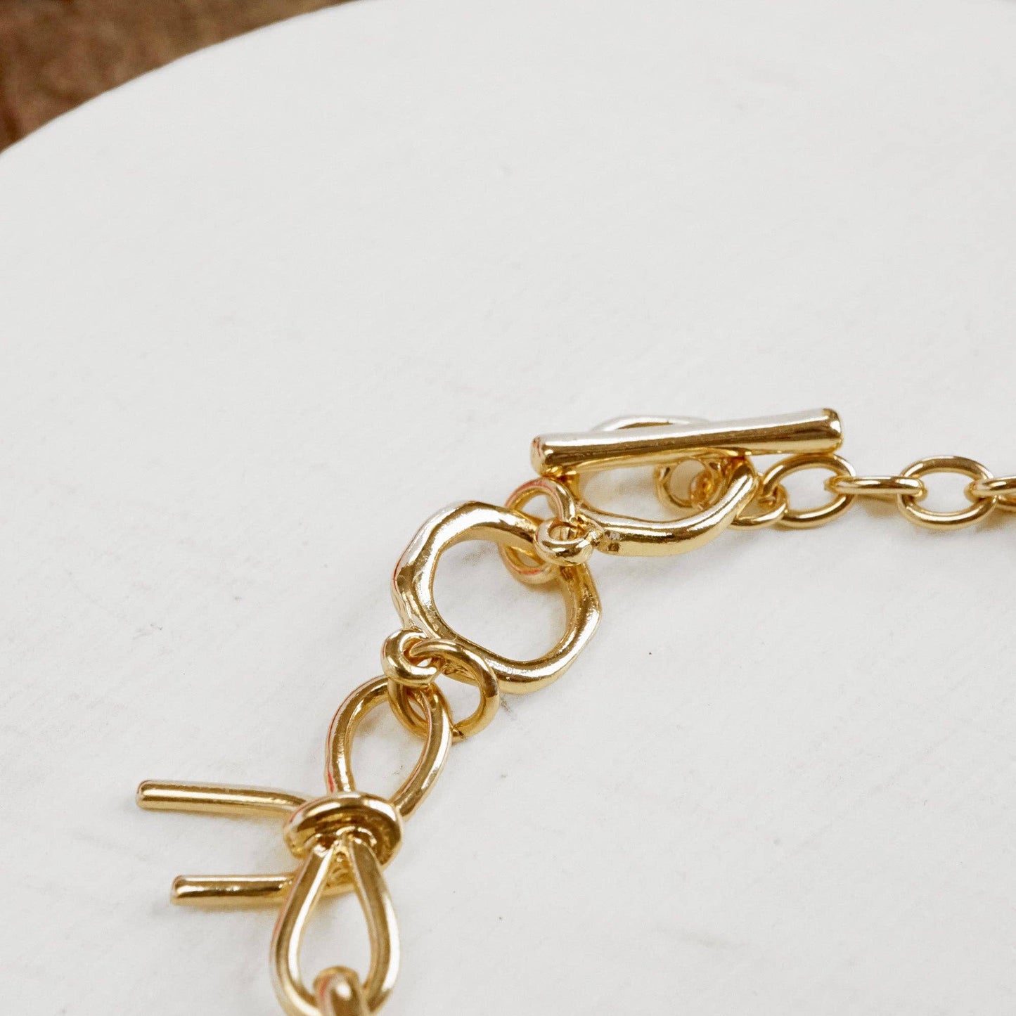 #396 Bow Link Bracelet Gold Tone
