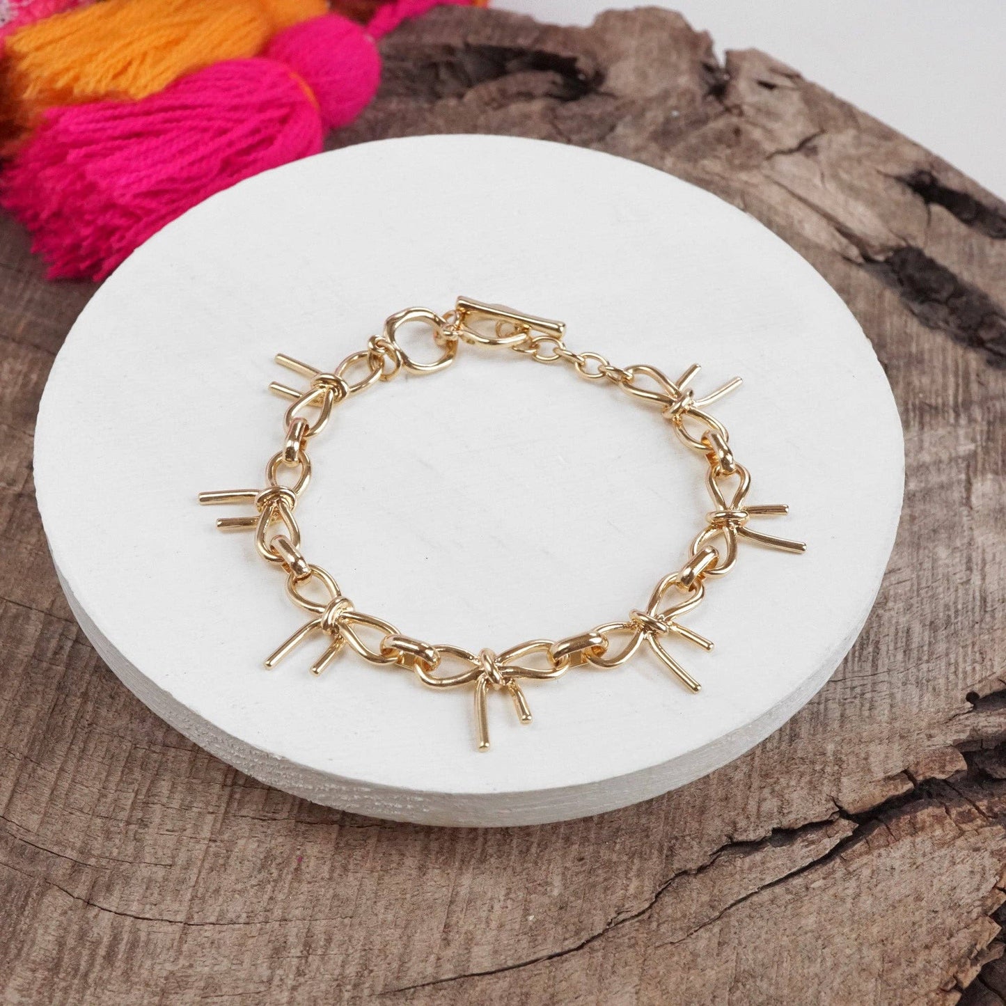 #396 Bow Link Bracelet Gold Tone
