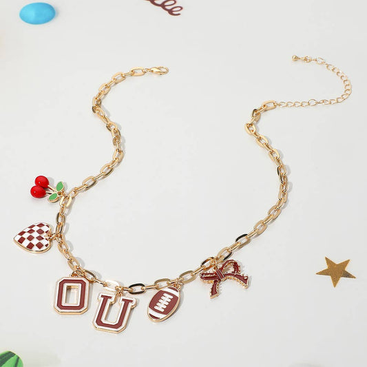#469  Football Theme Bow Cherry Heart Charm Station Necklace