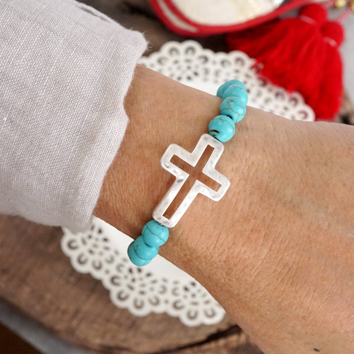 #398 Cross bracelet with Turquoise color beads and silver hammered cross